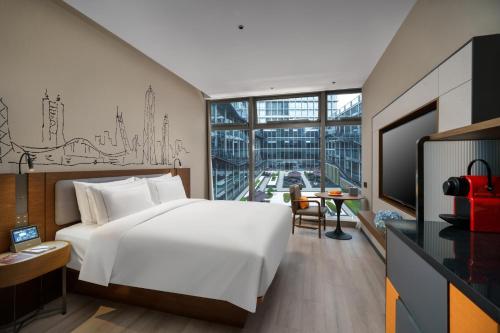 Imagen de la habitación del Hotel UrCove by HYATT Futian CBD. Foto 3