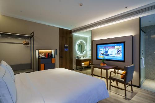 Imagen de la habitación del Hotel UrCove by HYATT Futian CBD. Foto 5