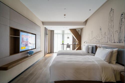 Imagen de la habitación del Hotel UrCove by HYATT Futian CBD. Foto 7