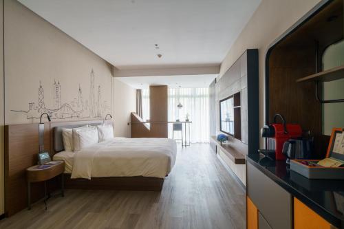 Imagen de la habitación del Hotel UrCove by HYATT Futian CBD. Foto 8