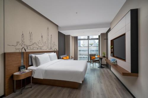 Imagen de la habitación del Hotel UrCove by HYATT Futian CBD. Foto 10