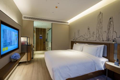 Imagen de la habitación del Hotel UrCove by HYATT Futian CBD. Foto 13