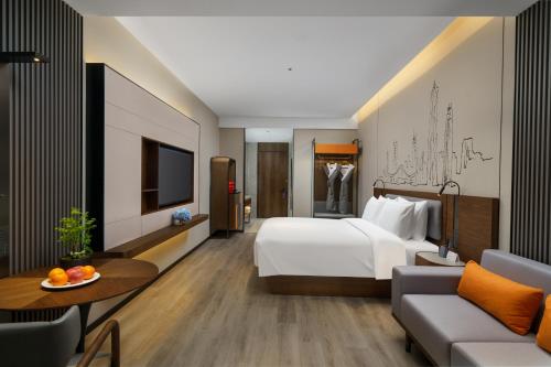 Imagen de la habitación del Hotel UrCove by HYATT Futian CBD. Foto 15