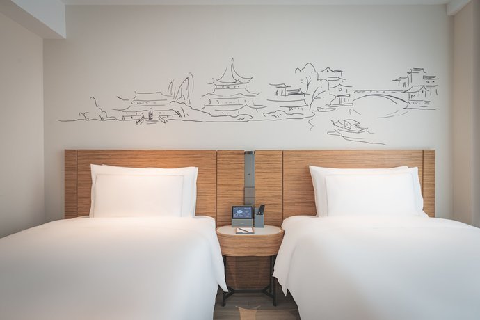 Imagen de la habitación del Hotel UrCove by HYATT Nanjing Downtown. Foto 13