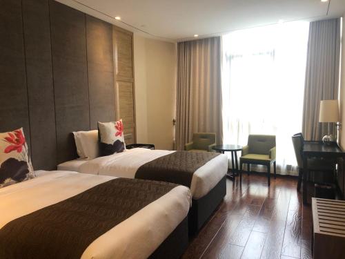 Imagen de la habitación del Hotel UrCove by HYATT Shanghai Pudong East. Foto 2