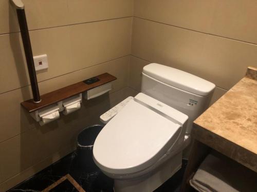 Imagen de la habitación del Hotel UrCove by HYATT Shanghai Pudong East. Foto 3