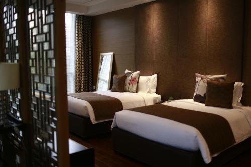 Imagen de la habitación del Hotel UrCove by HYATT Shanghai Pudong East. Foto 7