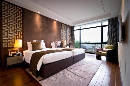 Imagen de la habitación del Hotel UrCove by HYATT Shanghai Pudong East. Foto 8