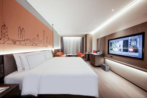 Imagen de la habitación del Hotel UrCove by HYATT Shenzhen Luohu. Foto 15