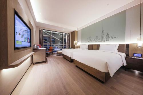Imagen de la habitación del Hotel UrCove by HYATT Shenzhen Luohu. Foto 16