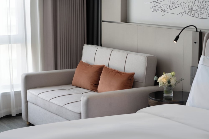 Imagen de la habitación del Hotel UrCove by Hyatt Aksu Century Square. Foto 11