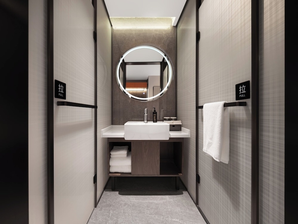 Imagen de la habitación del Hotel UrCove by Hyatt Aksu Century Square. Foto 12