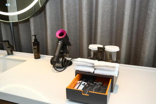 Imagen de la habitación del Hotel UrCove by Hyatt Foshan Downtown. Foto 17