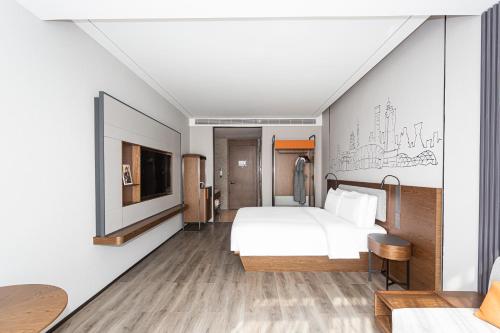 Imagen de la habitación del Hotel UrCove by Hyatt Foshan Downtown. Foto 18