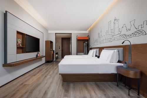 Imagen de la habitación del Hotel UrCove by Hyatt Foshan Downtown. Foto 20