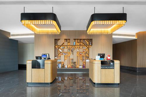 Imagen general del Hotel UrCove by Hyatt Tianjin West Railway STN. Foto 5