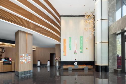 Imagen general del Hotel UrCove by Hyatt Tianjin West Railway STN. Foto 6