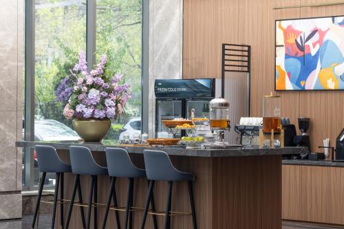 Imagen general del Hotel UrCove by Hyatt Tianjin West Railway STN. Foto 7