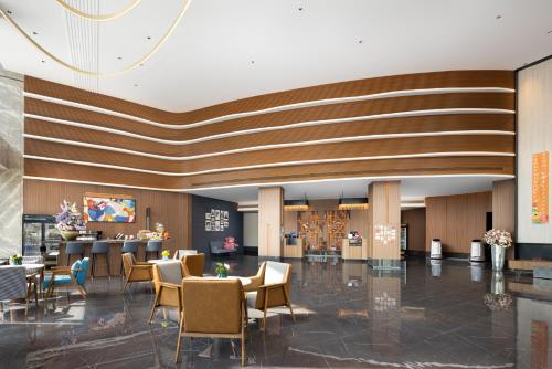 Imagen general del Hotel UrCove by Hyatt Tianjin West Railway STN. Foto 8