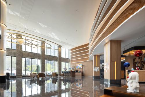 Imagen general del Hotel UrCove by Hyatt Tianjin West Railway STN. Foto 9