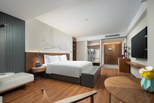 Imagen de la habitación del Hotel UrCove by Hyatt Tianjin West Railway STN. Foto 17