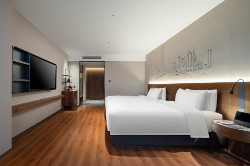 Imagen de la habitación del Hotel UrCove by Hyatt Tianjin West Railway STN. Foto 19