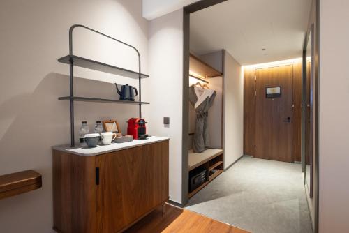 Imagen de la habitación del Hotel UrCove by Hyatt Tianjin West Railway STN. Foto 20