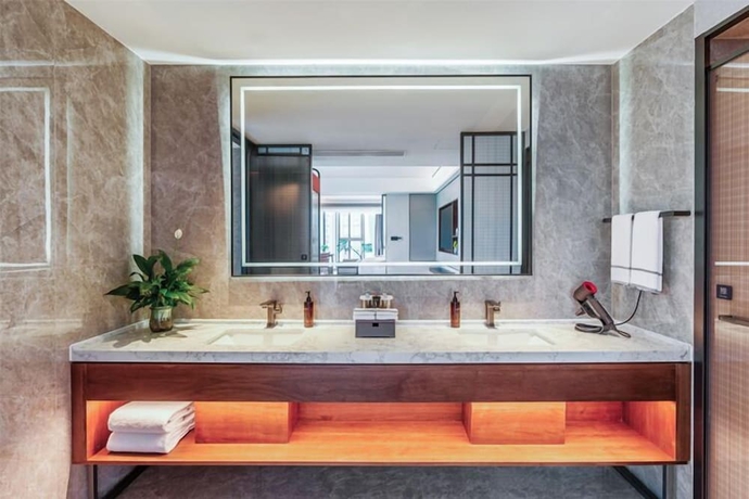 Imagen de la habitación del Hotel UrCove by Hyatt Weifang City Center. Foto 14