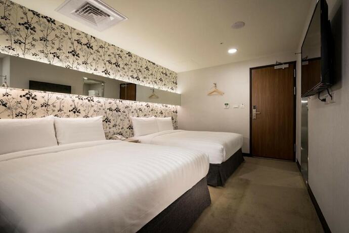 Imagen de la habitación del Hotel UrHome. Foto 17