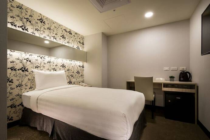 Imagen de la habitación del Hotel UrHome. Foto 18