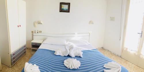 Imagen de la habitación del Hotel Urania, Riccione. Foto 8