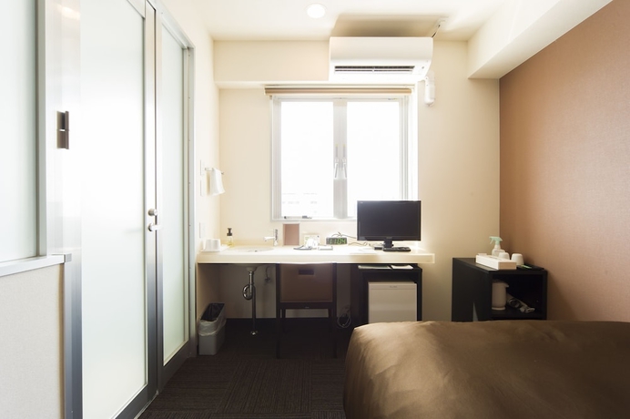 Imagen de la habitación del Hotel Urbain Hiroshima Central. Foto 11