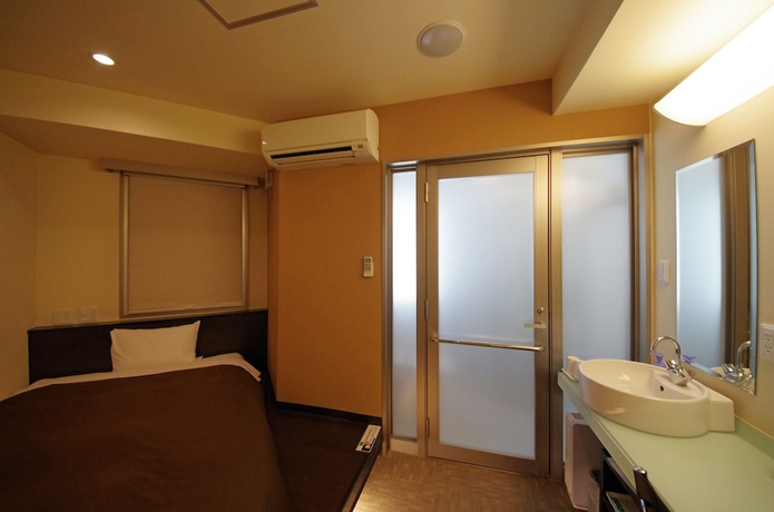 Imagen de la habitación del Hotel Urbain Hiroshima Executive. Foto 9