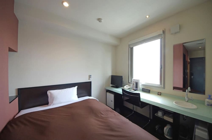 Imagen de la habitación del Hotel Urbain Hiroshima Executive. Foto 19