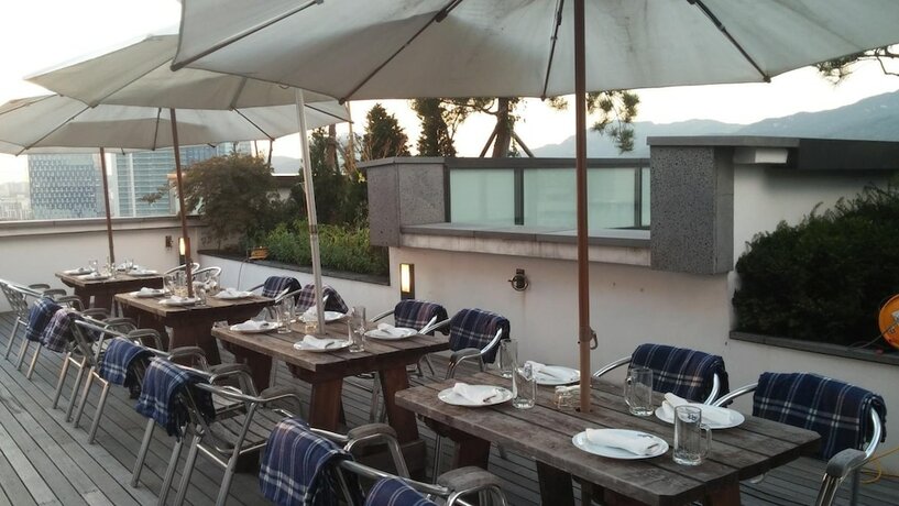 Imagen del bar/restaurante del Hotel Urban Boutique, Anyang. Foto 16