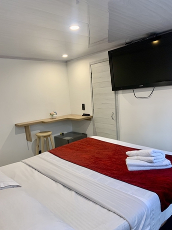 Imagen de la habitación del Hotel Urban Center Bogota. Foto 7