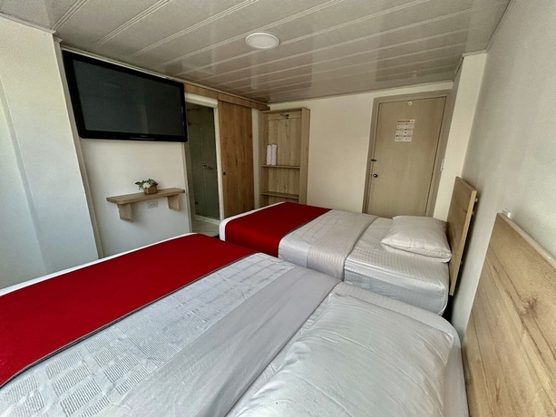 Imagen de la habitación del Hotel Urban Center Bogota. Foto 10