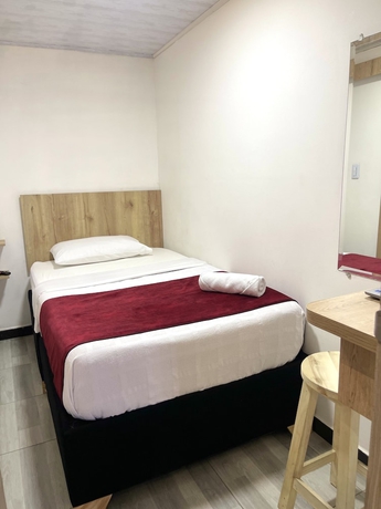 Imagen de la habitación del Hotel Urban Center Bogota. Foto 14
