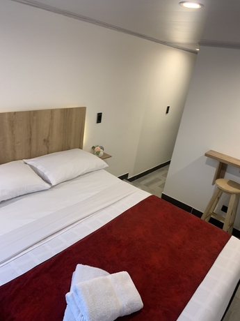Imagen de la habitación del Hotel Urban Center Bogota. Foto 15