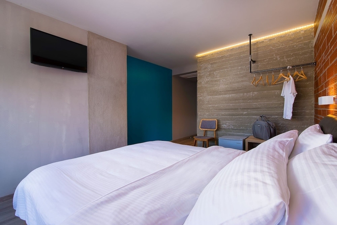 Imagen de la habitación del Hotel Urban Donkey. Foto 16