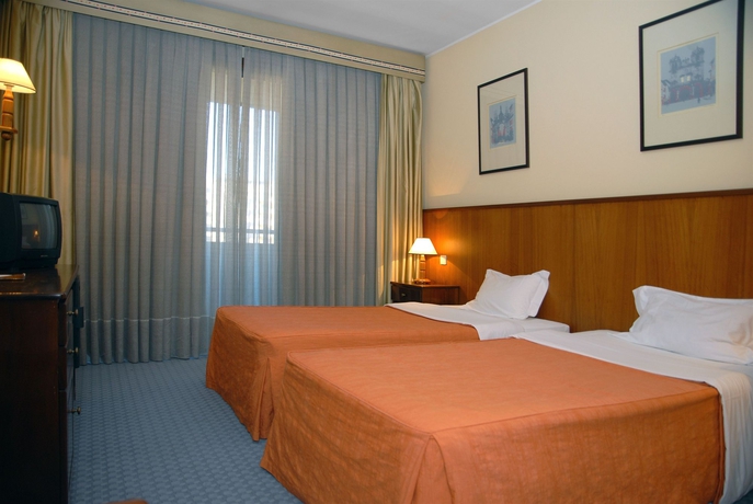 Imagen de la habitación del Hotel Urban Estação. Foto 4