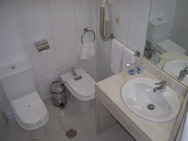 Imagen de la habitación del Hotel Urban Estação. Foto 10