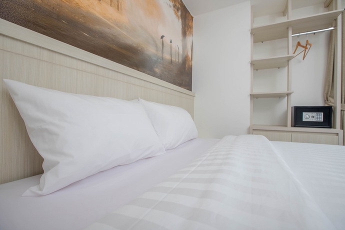Imagen de la habitación del Hotel Urban Express Homtel Serpong. Foto 2