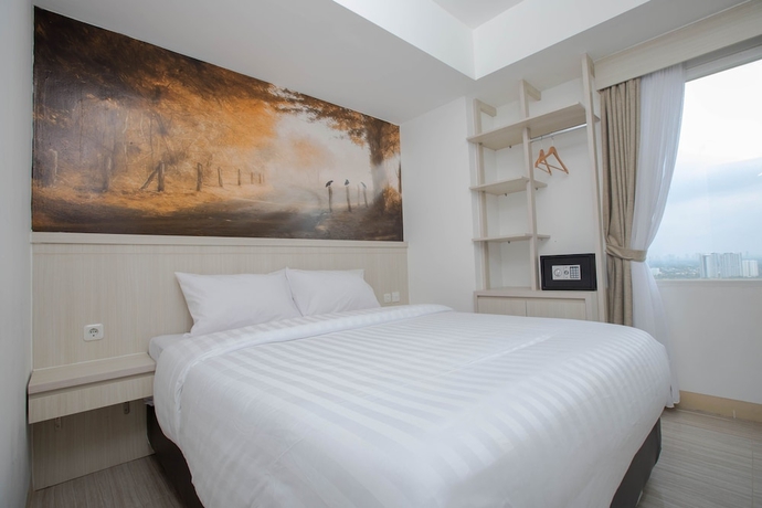 Imagen de la habitación del Hotel Urban Express Homtel Serpong. Foto 3