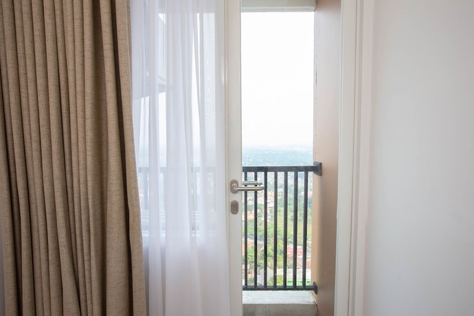 Imagen de la habitación del Hotel Urban Express Homtel Serpong. Foto 6