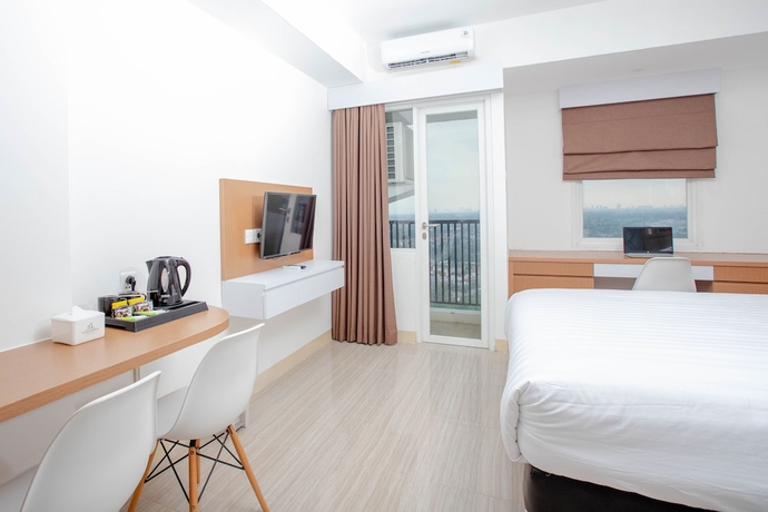 Imagen de la habitación del Hotel Urban Express Homtel Serpong. Foto 8