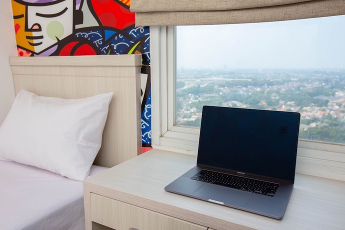 Imagen de la habitación del Hotel Urban Express Homtel Serpong. Foto 10