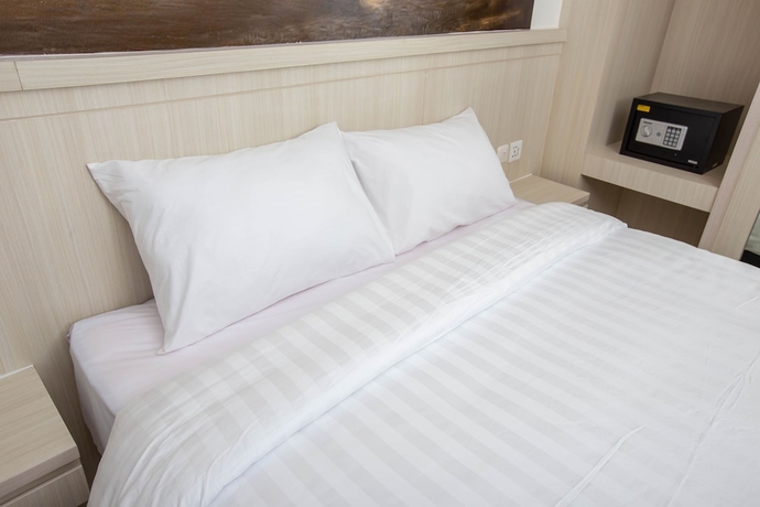 Imagen de la habitación del Hotel Urban Express Homtel Serpong. Foto 11