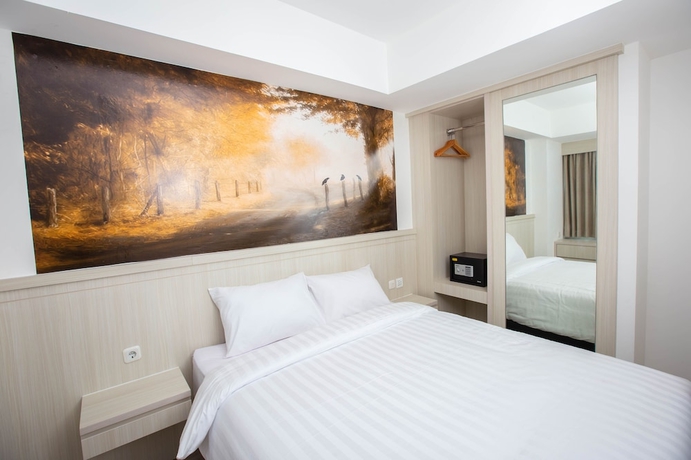 Imagen de la habitación del Hotel Urban Express Homtel Serpong. Foto 12