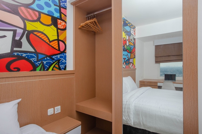 Imagen de la habitación del Hotel Urban Express Homtel Serpong. Foto 13